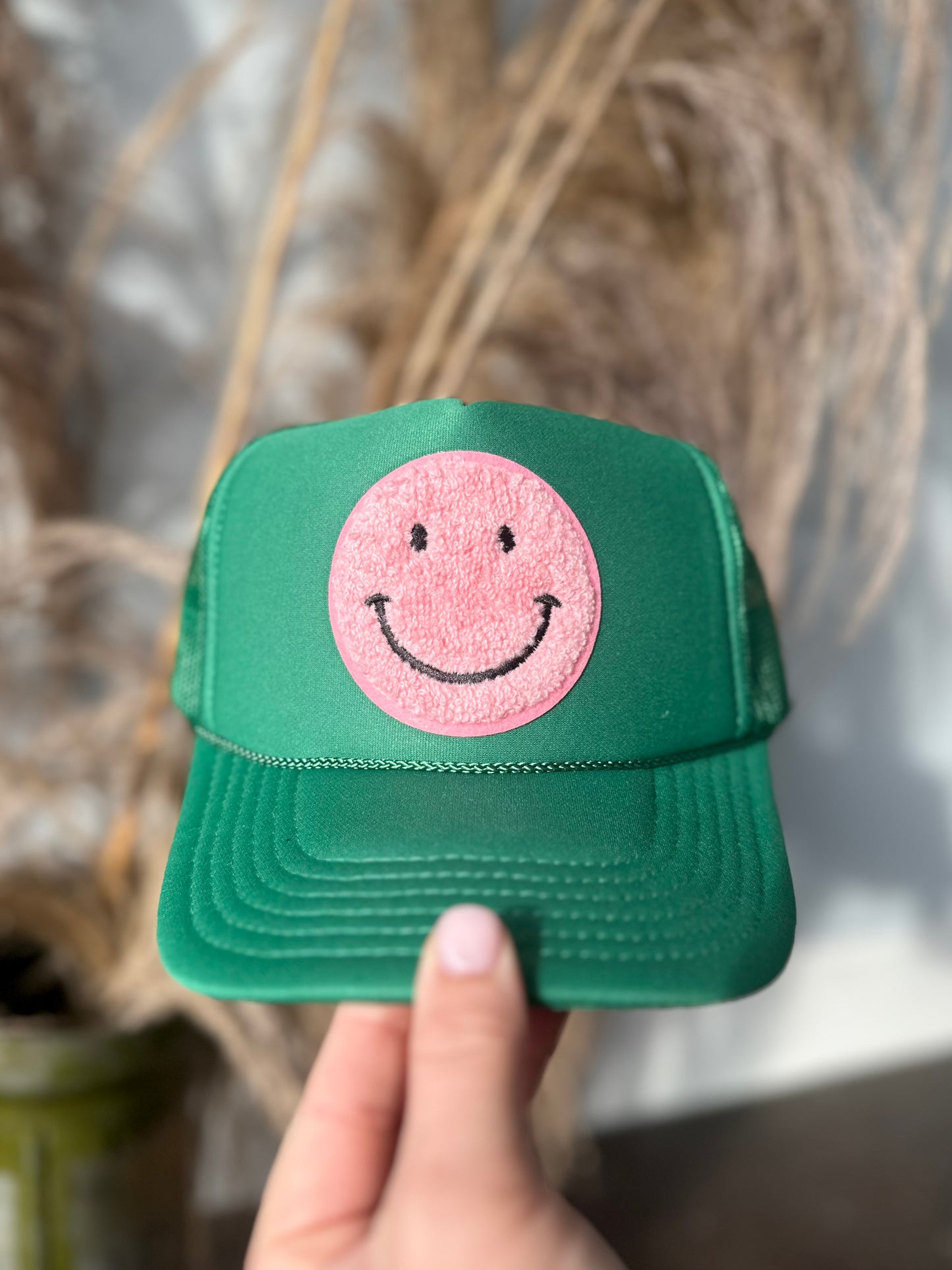 PINK SMILES GREEN TRUCKER HAT