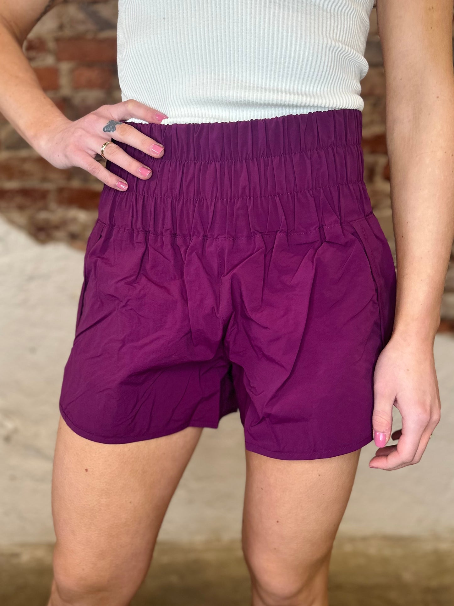 PLUM WINDBREAKER SHORTS