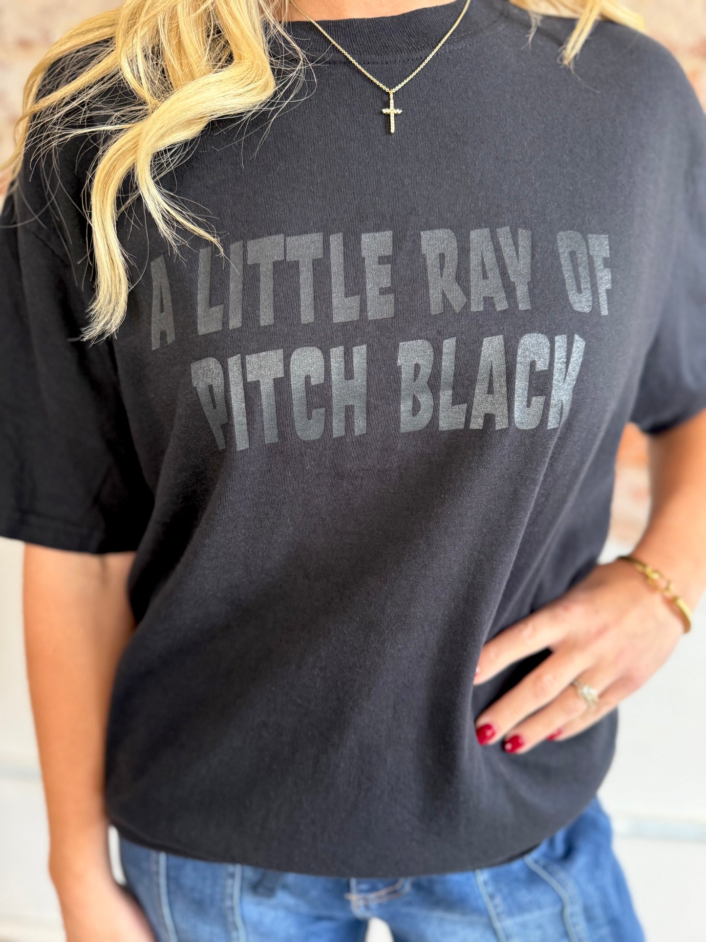 A LITTLE RAY BLACK TEE