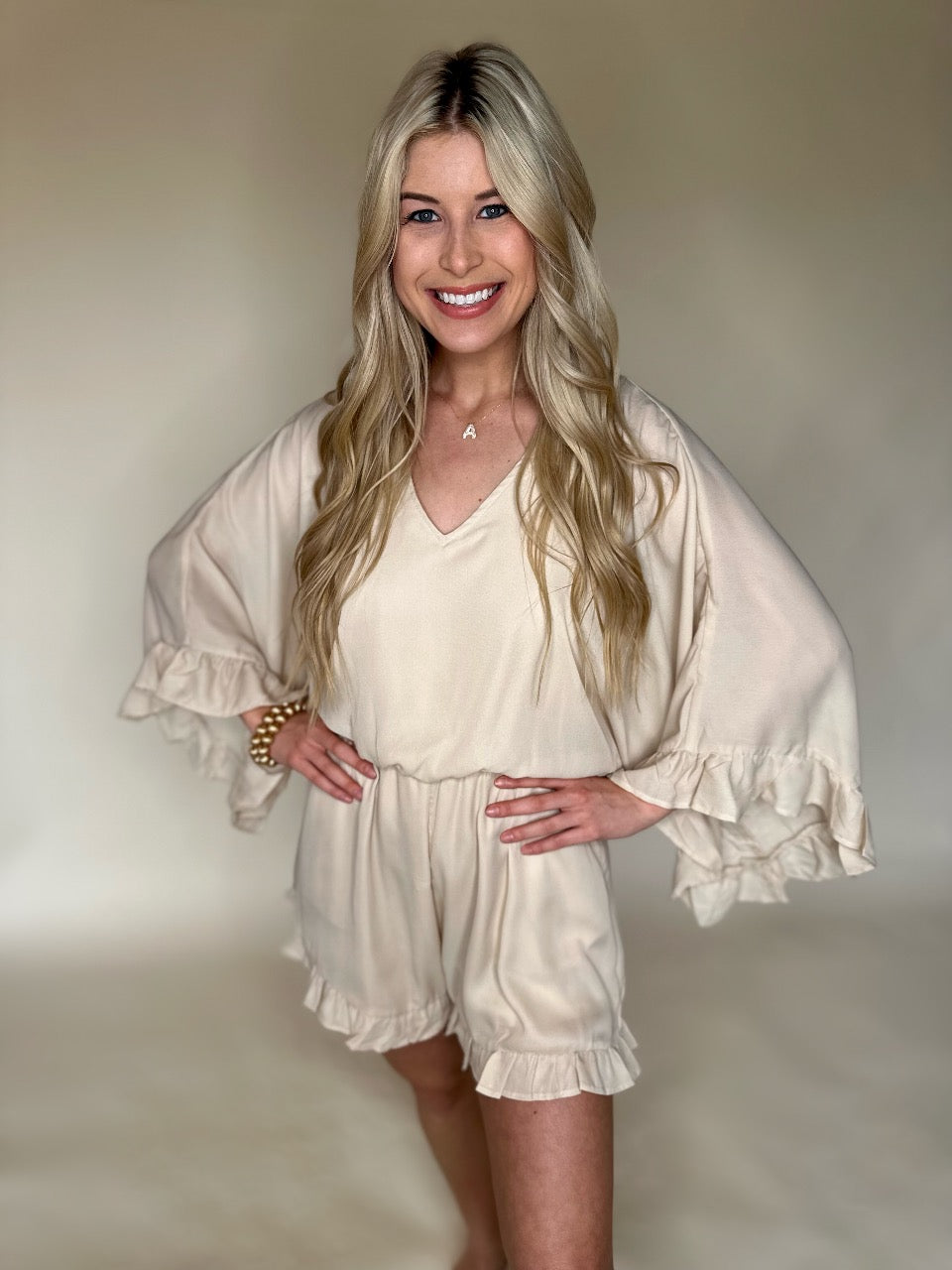 SAND RUFFLE SLEEVE ROMPER