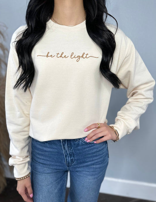 BE THE LIGHT EMBROIDERED SWEATSHIRT