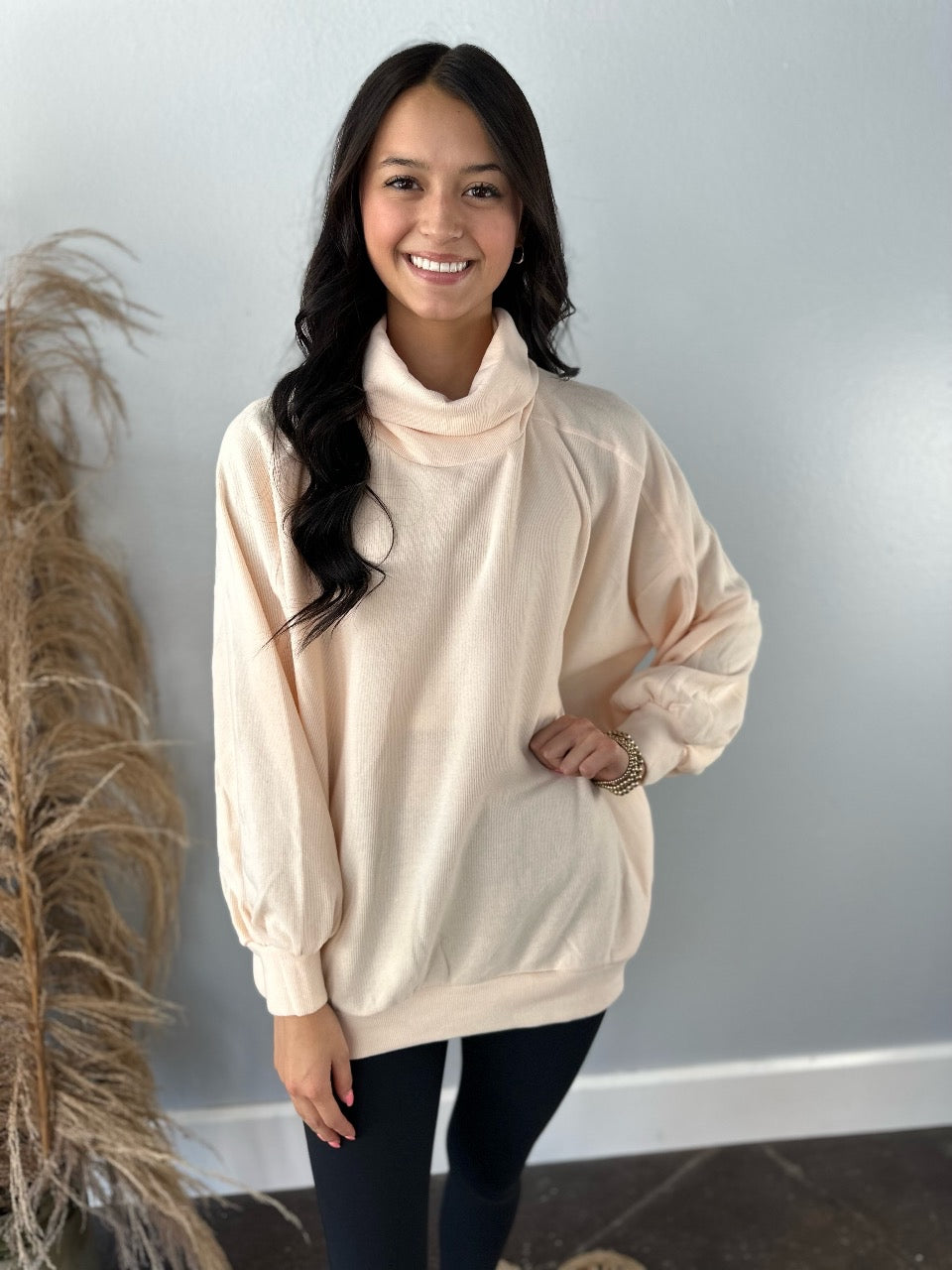 PEACH RIBBED TURTLENECK PULLOVER