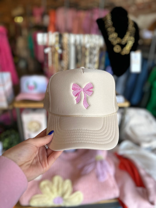 PINK EMBROIDERED BOW TAN TRUCKER HAT