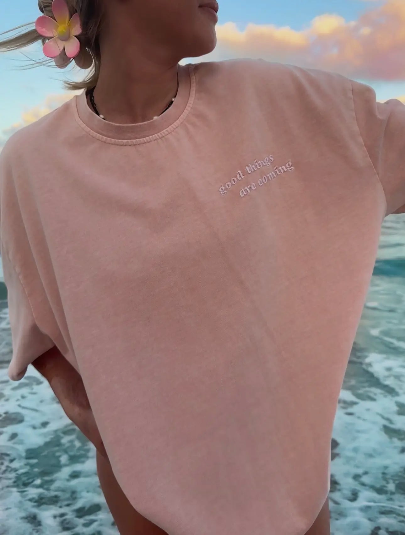 CORAL GOOD THINGS ARE COMING TEE