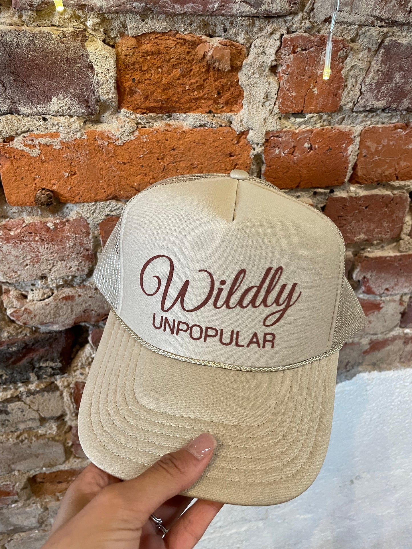 TAN UNPOPULAR TRUCKER HAT