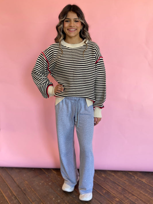 B/C SWEATER WITH RED ACCENT