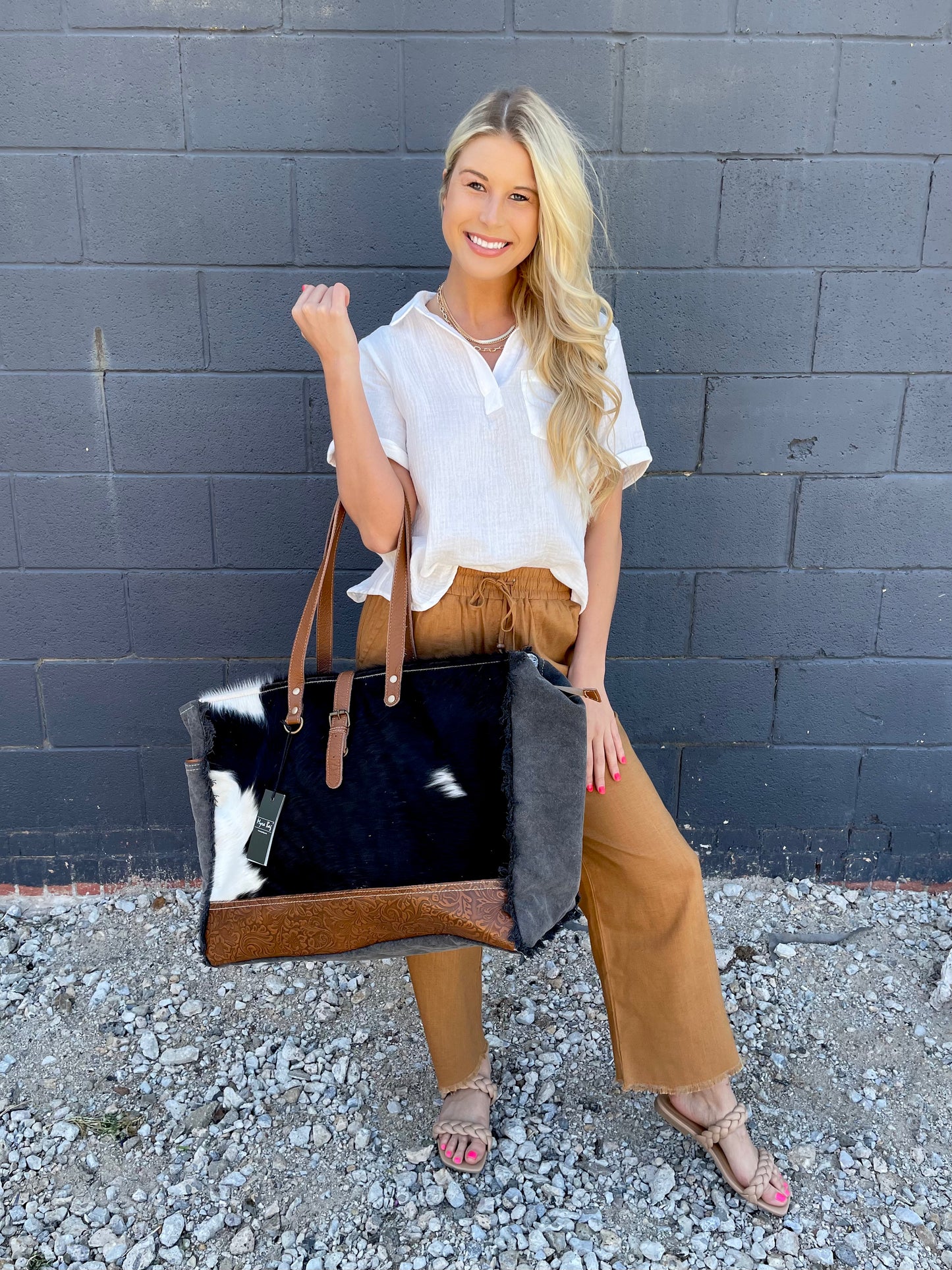 Black and white cowhide purse hotsell